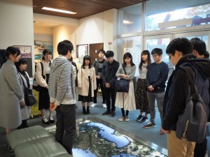 Listening to an explanation at the Coal Memorial Hall